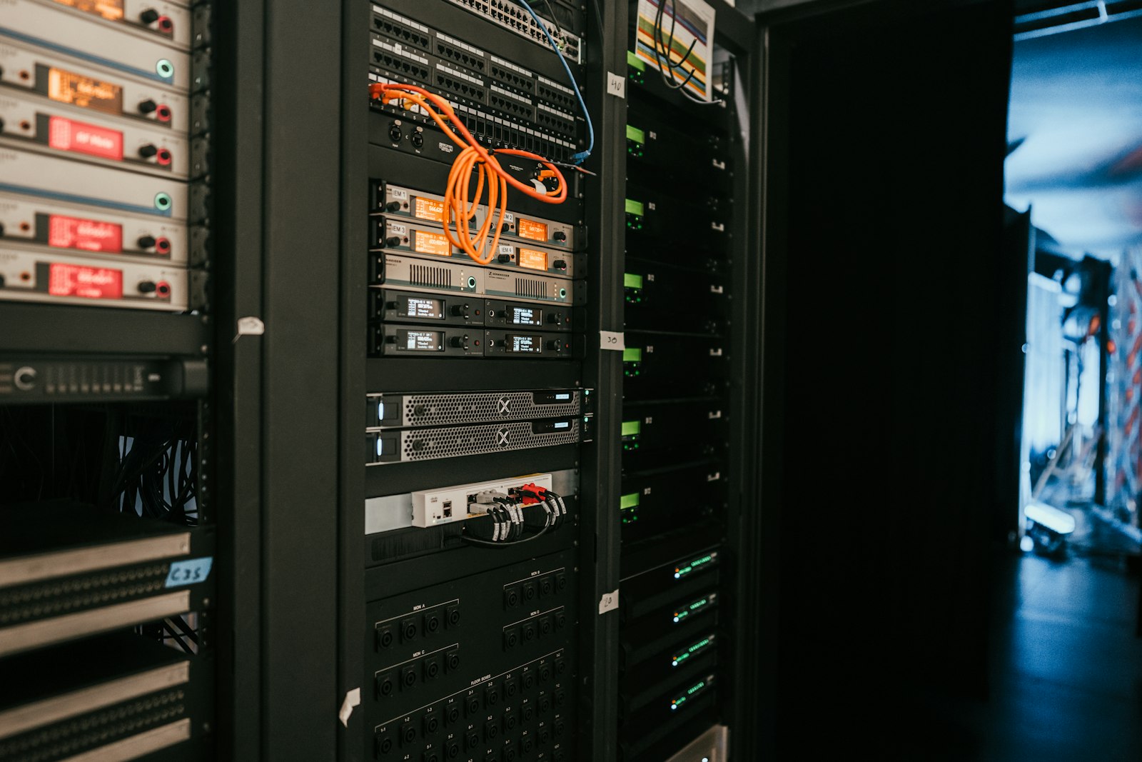 Server rack image used as a cover for an article about WhatsApp Business API onboarding operations